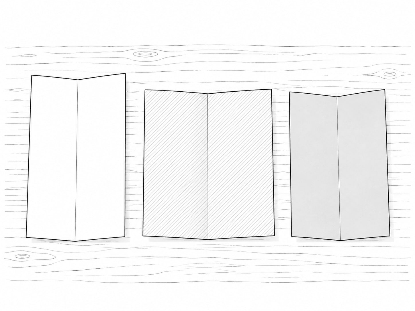 Three blank folded flyers in slightly different shades of blue laid side by side on a desk.