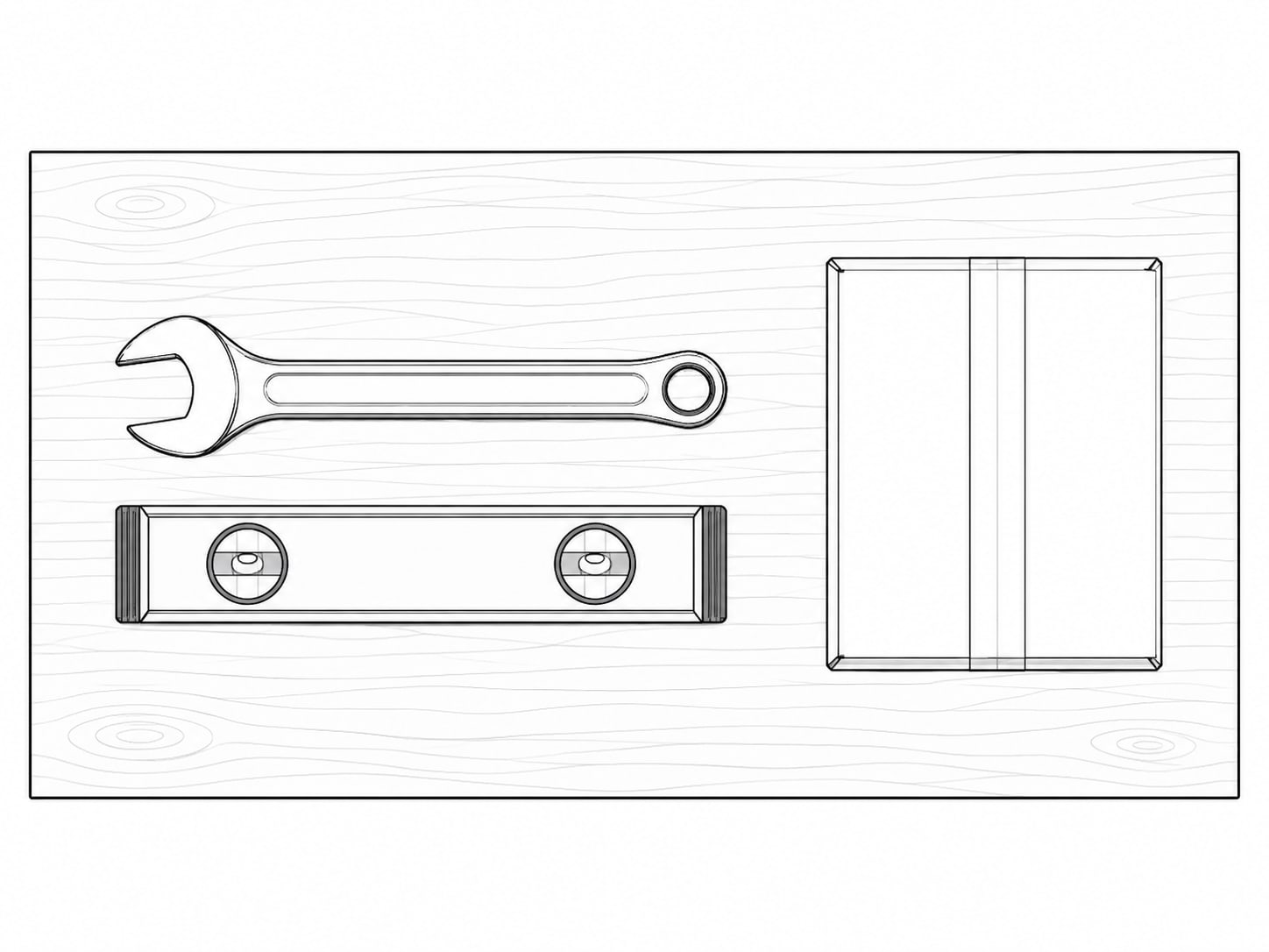 A single wrench and a small level lying side by side on a clean workbench next to an unopened box.