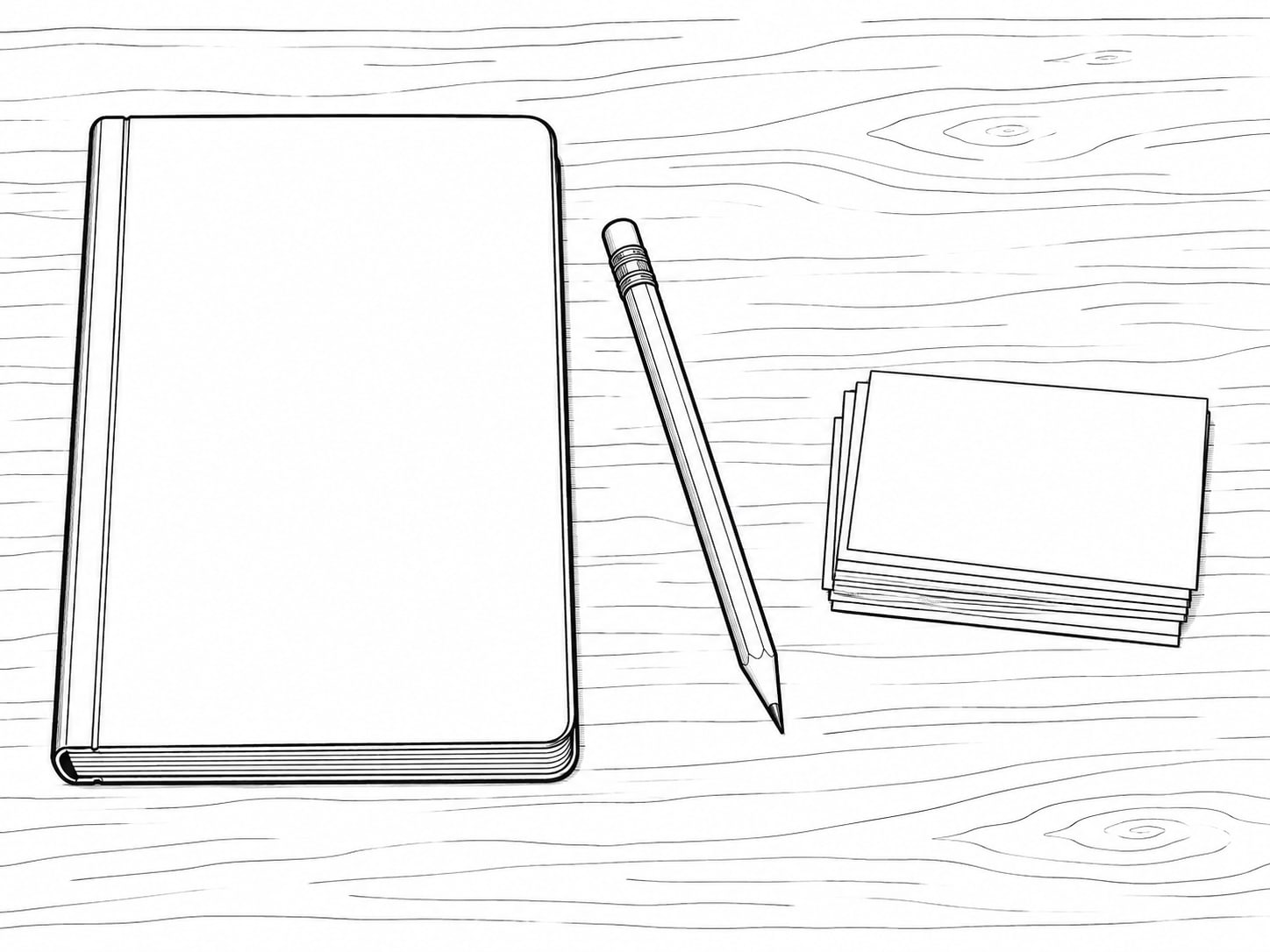 A closed notebook and a pencil beside a small stack of blank index cards on a plain wooden desk.