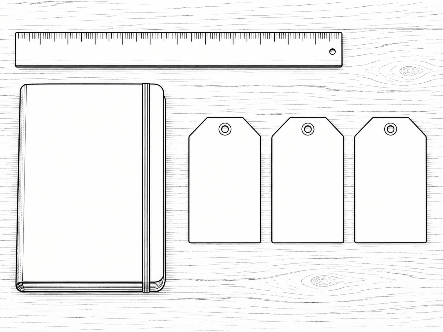 A wooden desk with a closed notebook, a ruler and three blank paper tags laid side by side.