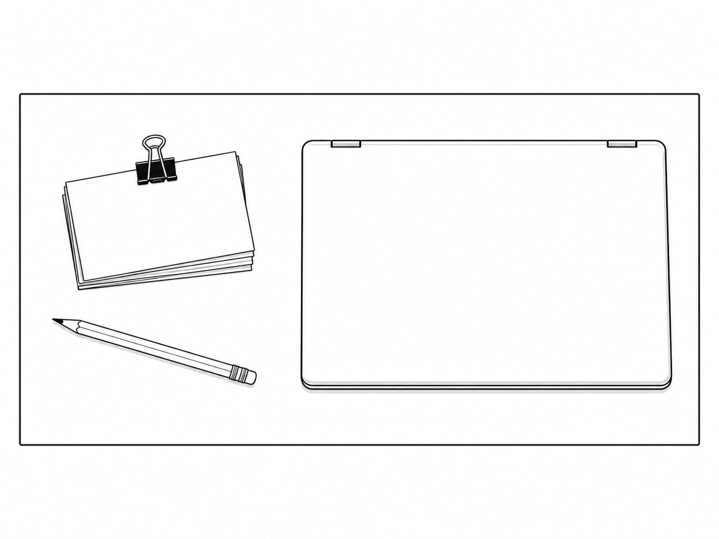 A stack of blank index cards held by a binder clip next to a pencil and a closed laptop.