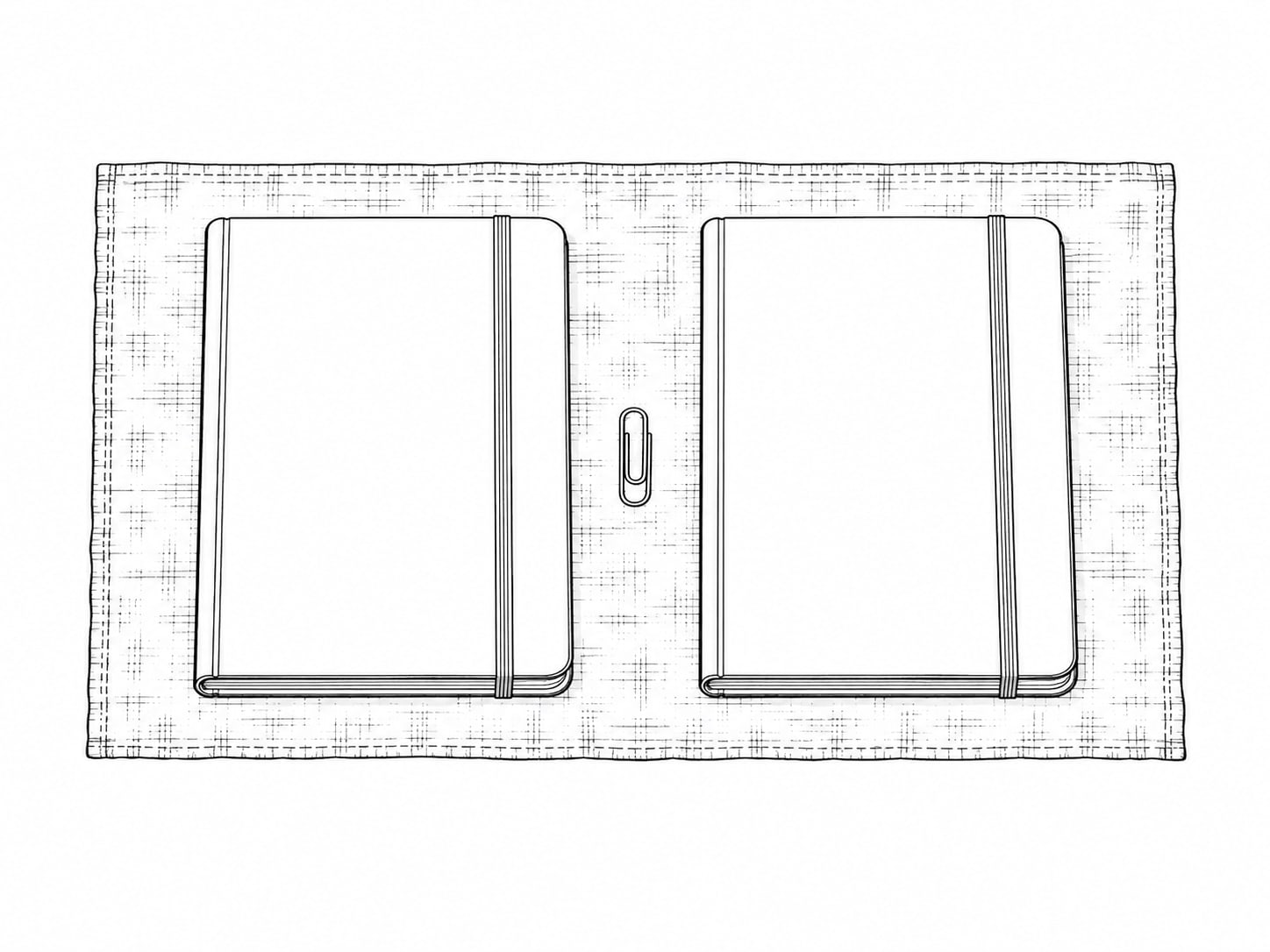 Dos cuadernos idénticos en blanco uno junto al otro sobre un mantel de lino gris, con un pequeño clip de latón entre ellos.